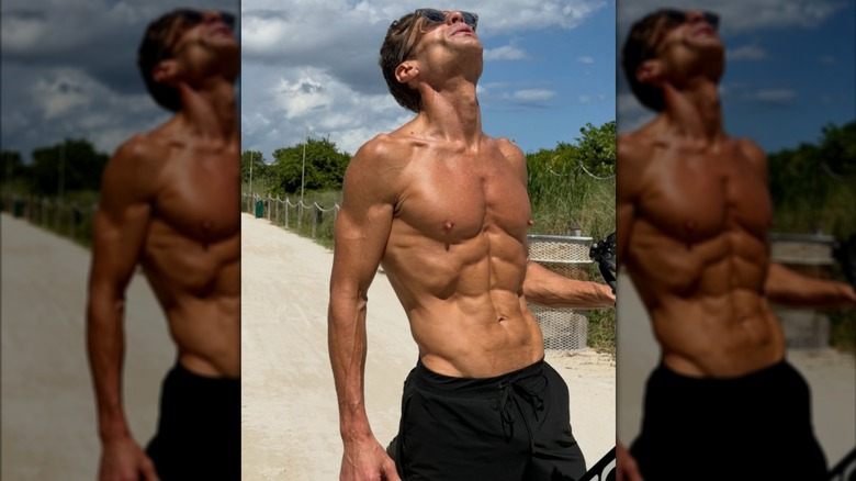 Ryan Seacrest shirtless soaking up the sun