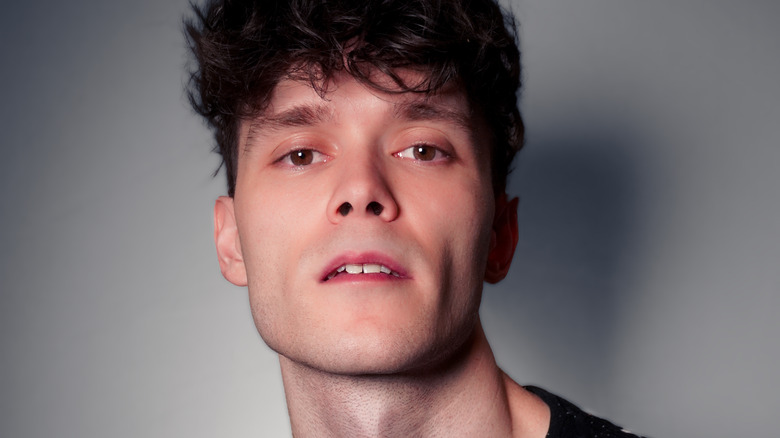 Tyler Martin posing as Emmett in the play Bonded