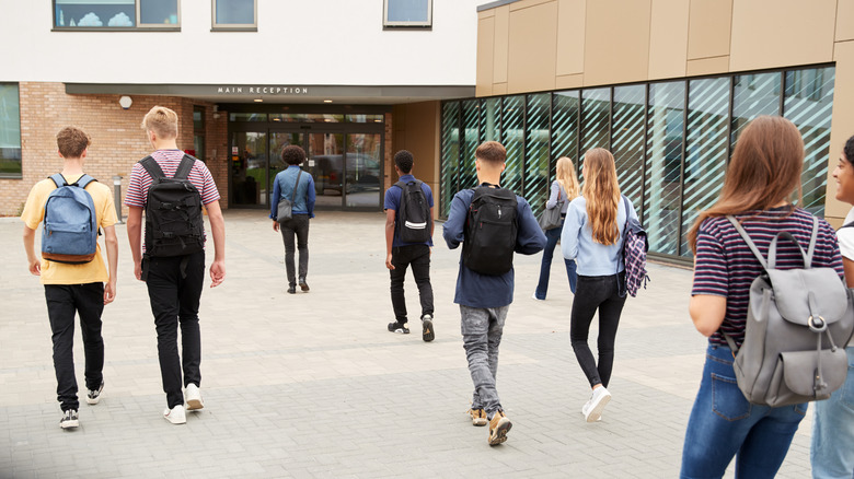 Students walking into a school