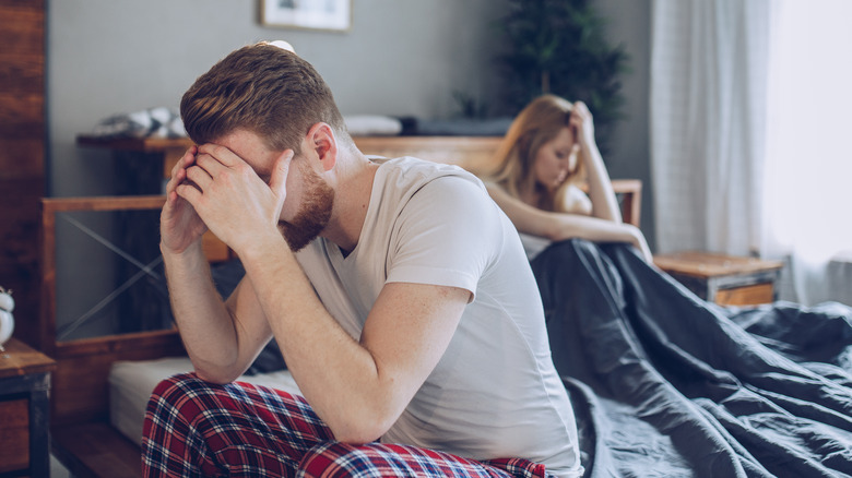 Man and woman in bed