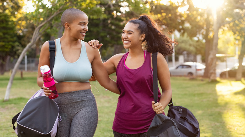 two people with gym bags