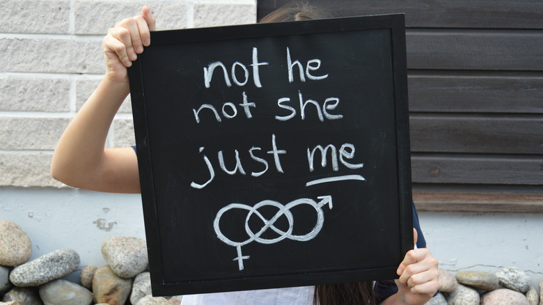 sign reading "not he, not she, just me"