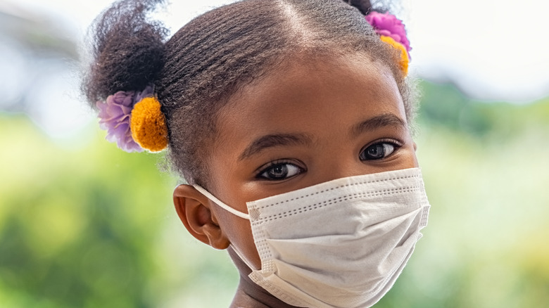 Black girl wearing a face mask