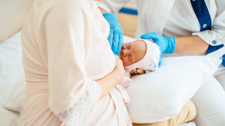 woman breastfeeding chilld