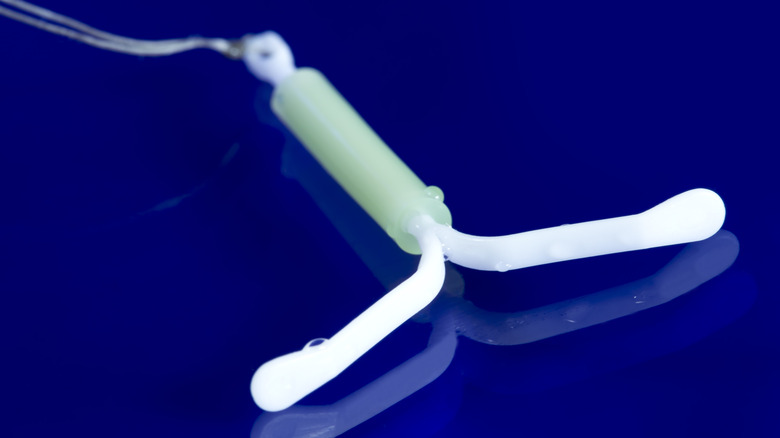 IUD on a blue background
