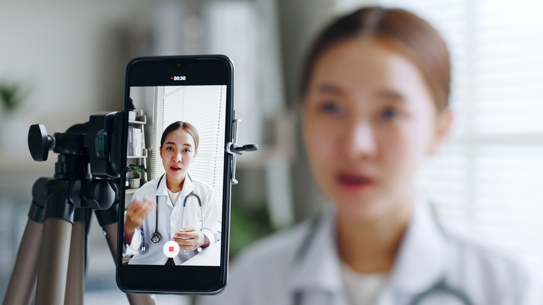 Doctor filming video