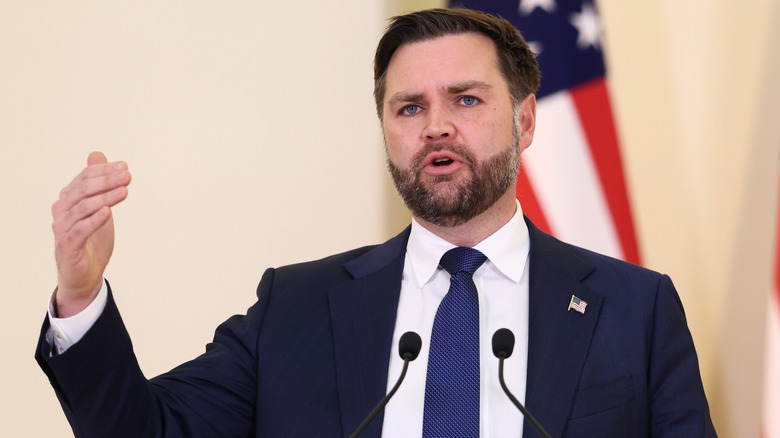 JD Vance gesturing while giving a speech