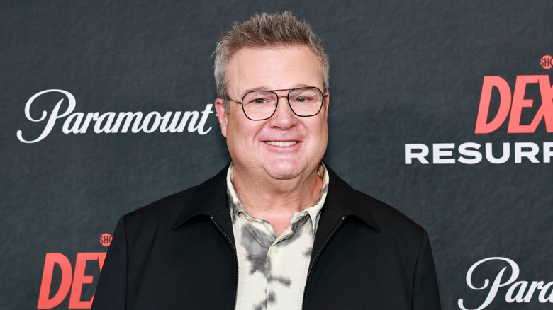 Eric Stonestreet poses at an event