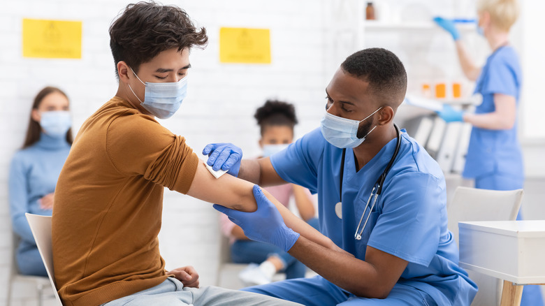 man getting vaccine