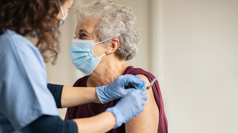 woman getting vaccine