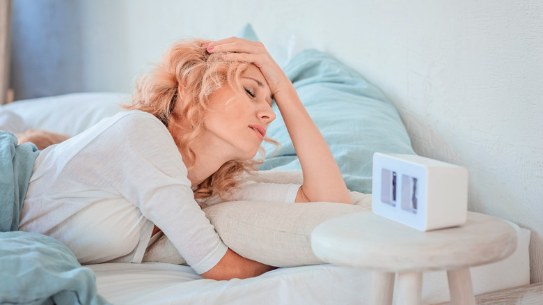 Sleep deprived woman feeling hormonal