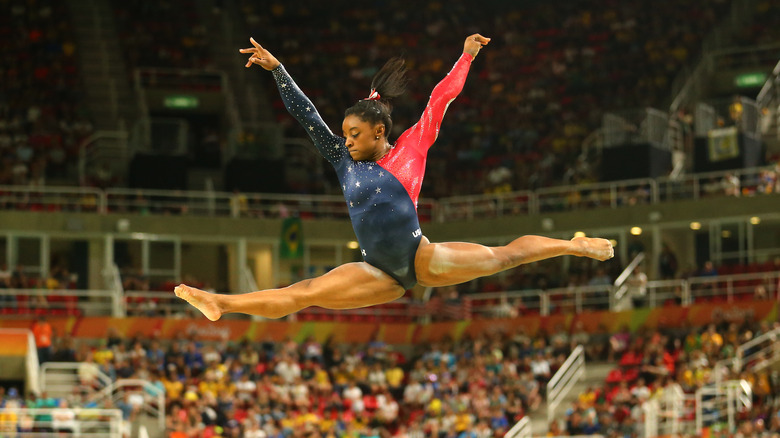 Simone Biles performing mid-air splits