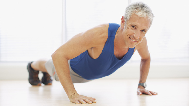 Older man doing pushup