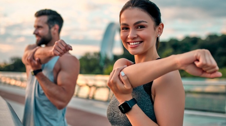 Active couple stretching together