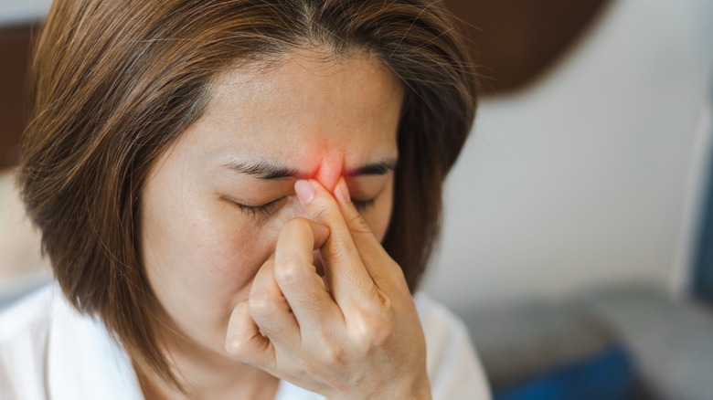 Woman with sinus headache