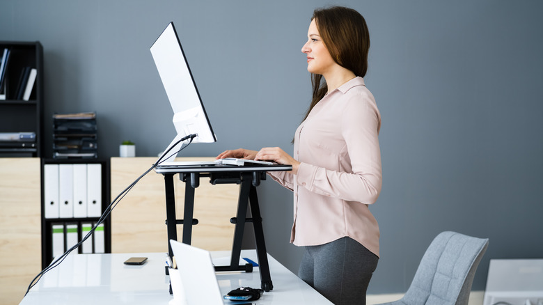 Woman working at standing desk