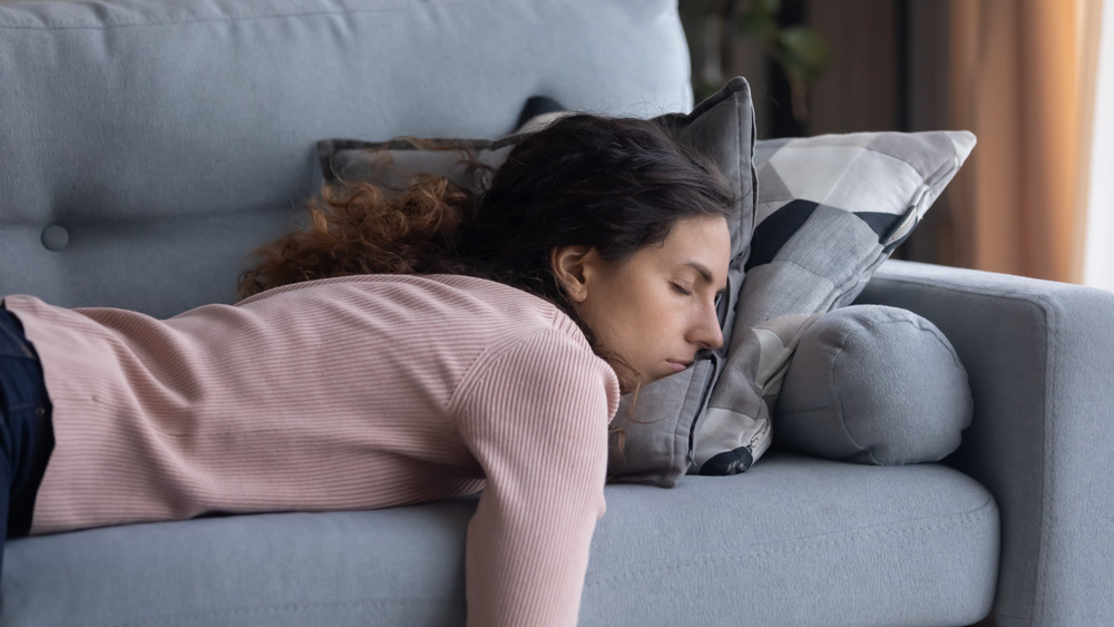 Woman sleeping on the couch