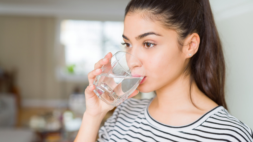Woman drinking a glass of water