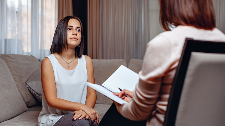 Counselor working with patient