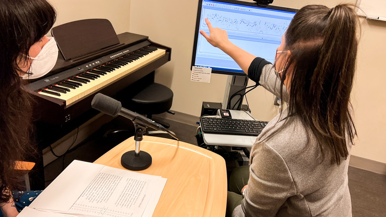 Anna Lichtenstein working on voice training with patient