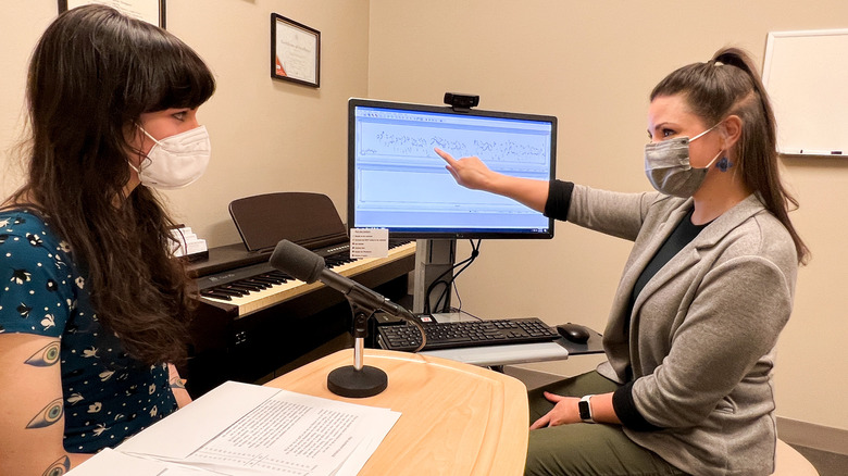 Anna Lichtenstein talking with patient