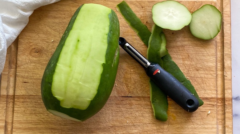 green papaya, partially peeled