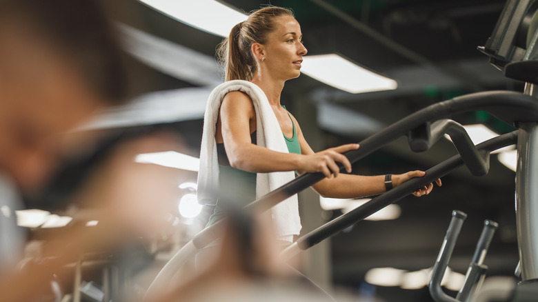 woman using a stair machine