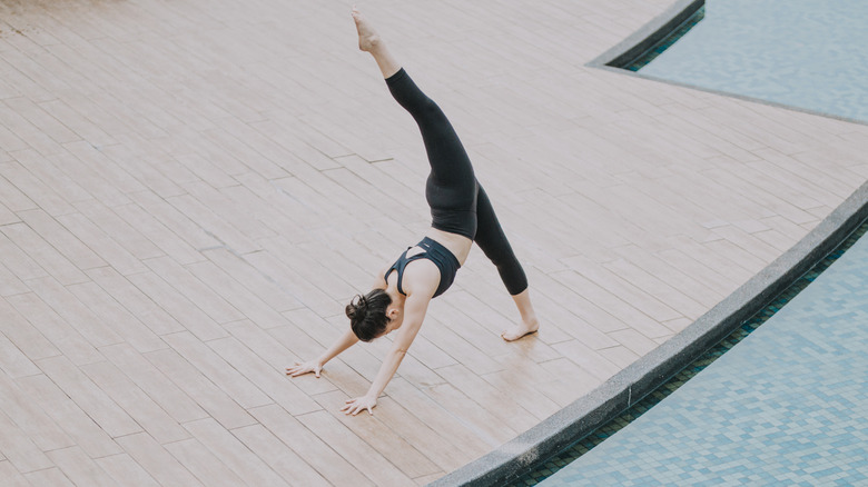 close-up of yoga mat rolling out