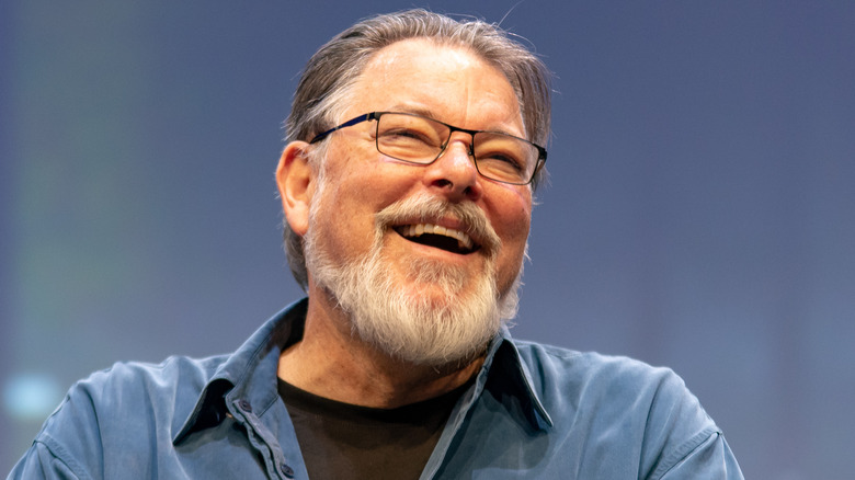 Jonathan Frakes laughing at a Star Trek panel