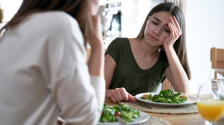 mother supports daughter with eating disorder