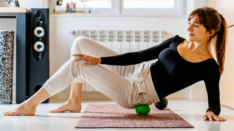 young woman doing pelvic exercise