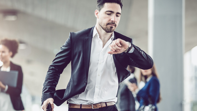 Man running late for work in the morning