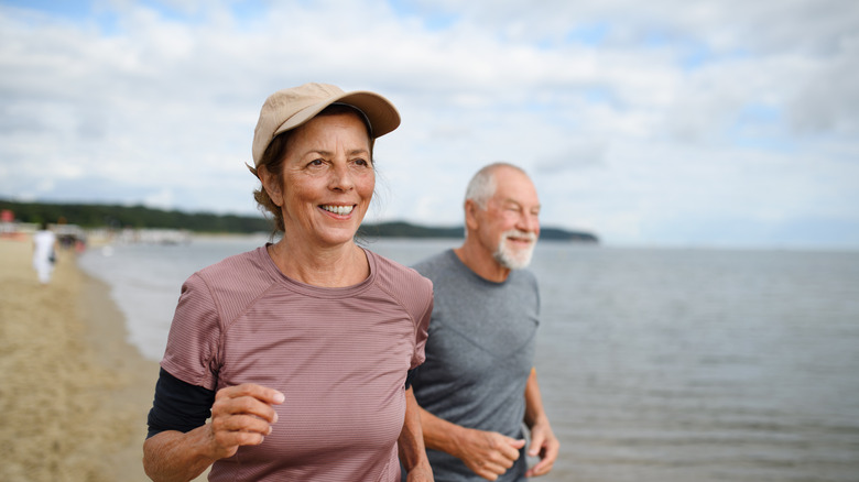 couple running on beach