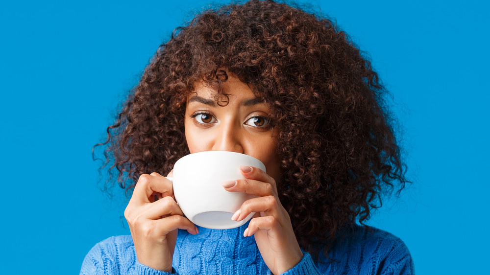 woman drinking coffee