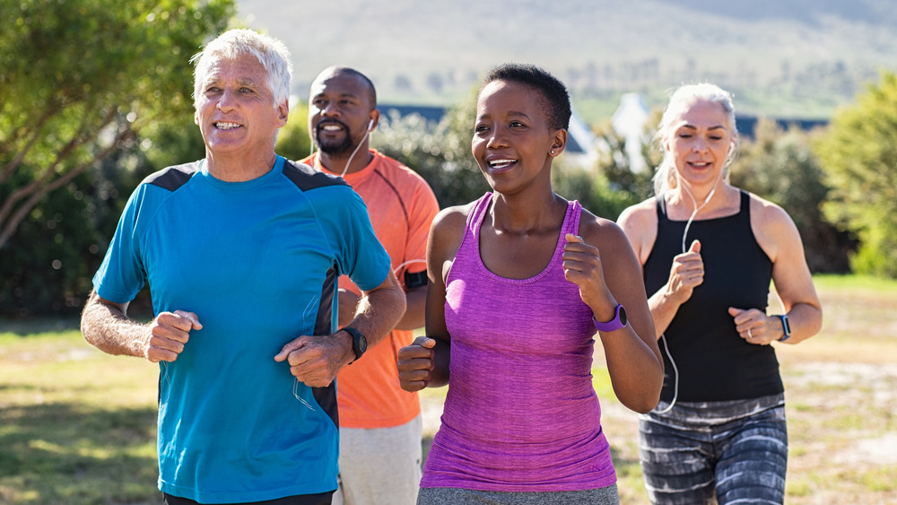 group of people running outside