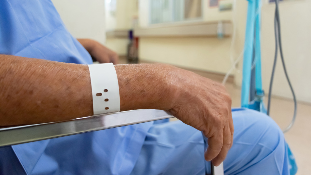 Stock photo of a closeup of a man's arm in an ICU