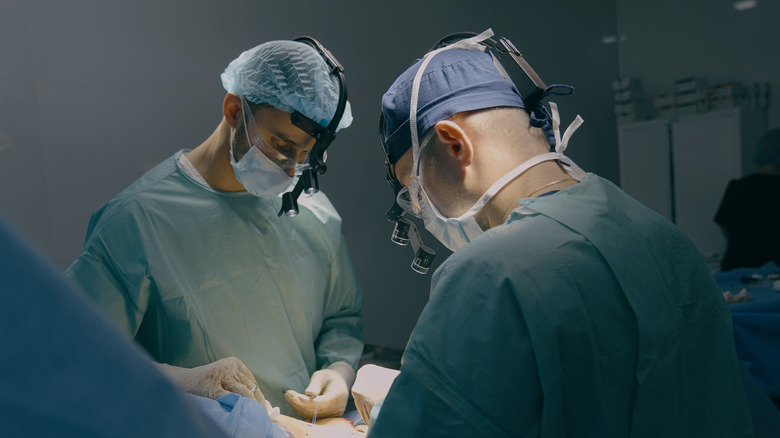 surgeons performing bariatric surgery procedure