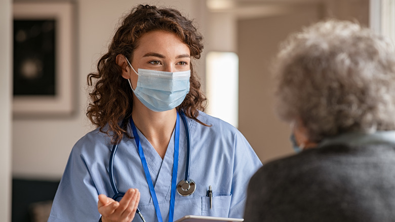 Doctor advising older patient