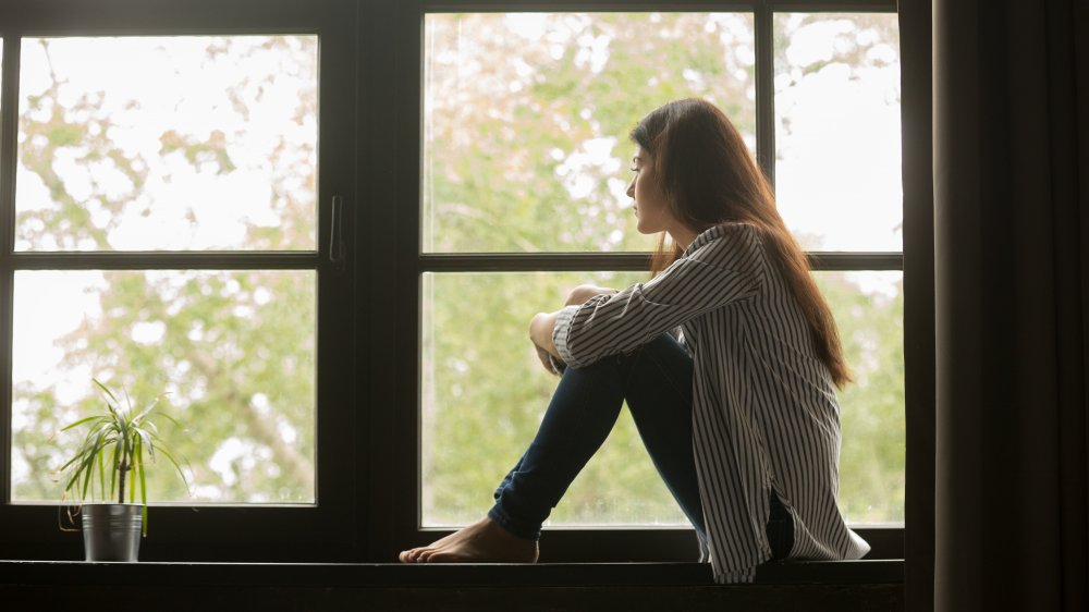 teen contemplating vaping