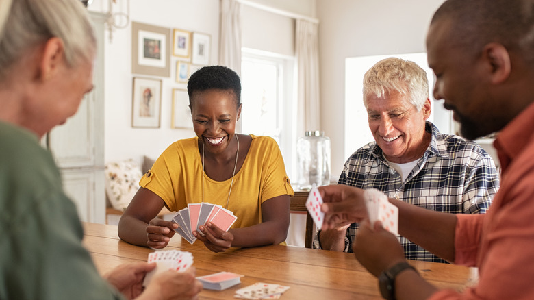 couples playing cards