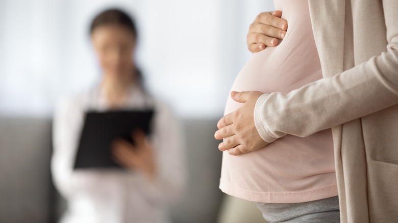pregnant woman at doctor's office