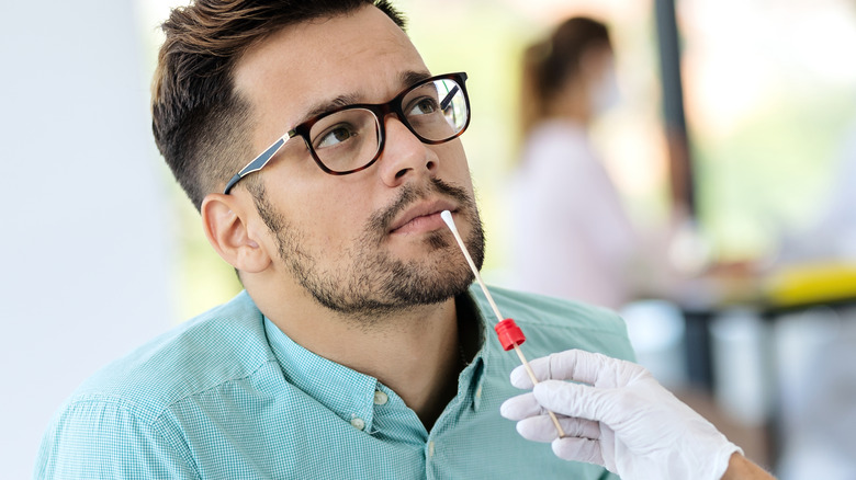 Man receiving PCR test