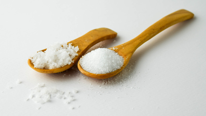 sugar and salt on spoons