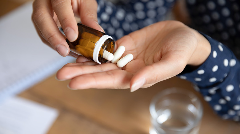 medication pills palm