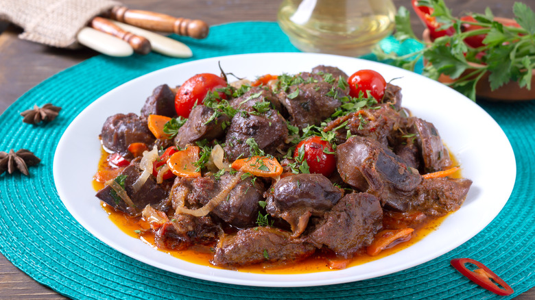 Turkey liver with vegetables on a plate