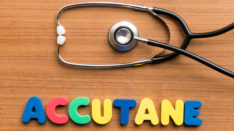 magnet letter spelling 'Accutane' and a stethoscope 