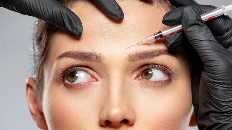 young woman receiving a Botox injection 