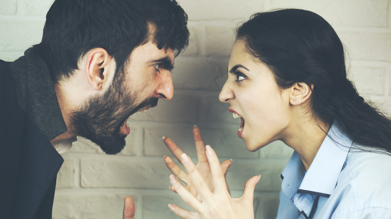 man and woman arguing