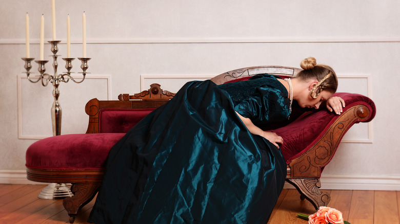 Victorian woman on couch