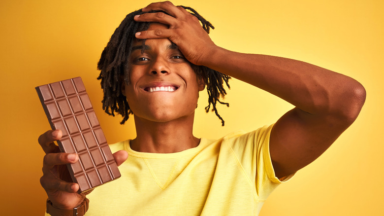 man holding chocolate